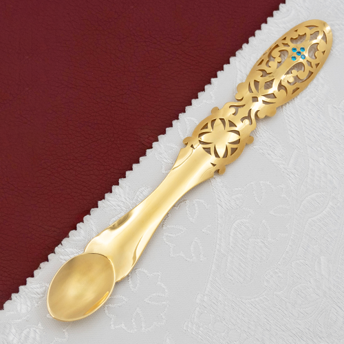 2.7.1516лп Лжица латунная с голубыми камнями в позолоте