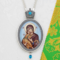 2.7.1145лр-2/1л Панагия латунная с голубыми камнями в серебрении